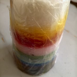 Rainbow breakthrough candle